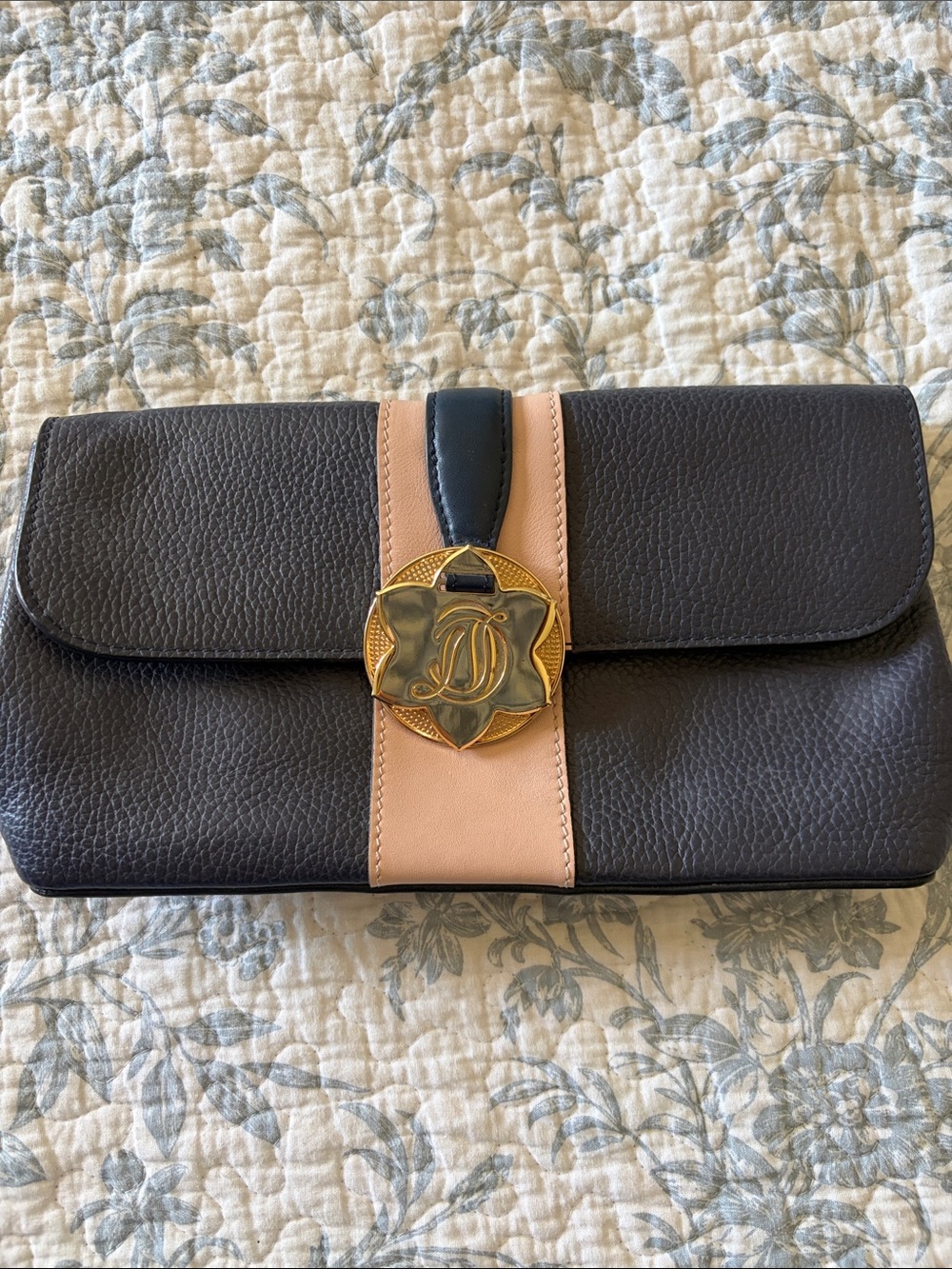 Draper James Black Leather Fold-Over Clutch with Blush Strap and Gold Medallion